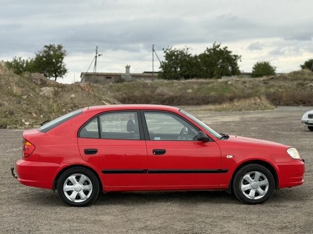 Червоний Хендай Акцент, об'ємом двигуна 1.6 л та пробігом 161 тис. км за 1700 $, фото 7 на Automoto.ua