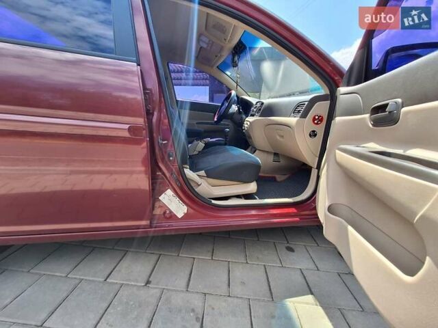 Красный Хендай Акцент, объемом двигателя 1.4 л и пробегом 258 тыс. км за 5200 $, фото 3 на Automoto.ua
