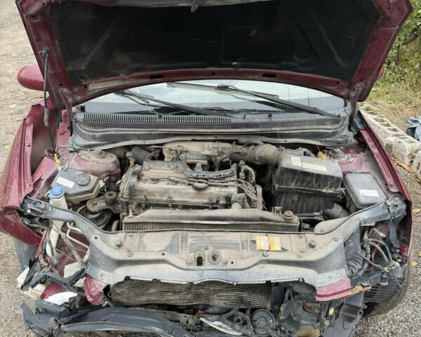 Красный Хендай Акцент, объемом двигателя 1.4 л и пробегом 186 тыс. км за 1500 $, фото 2 на Automoto.ua