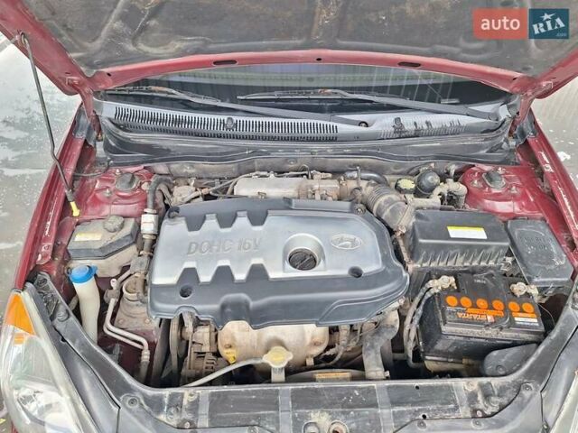 Красный Хендай Акцент, объемом двигателя 1.4 л и пробегом 258 тыс. км за 5200 $, фото 14 на Automoto.ua