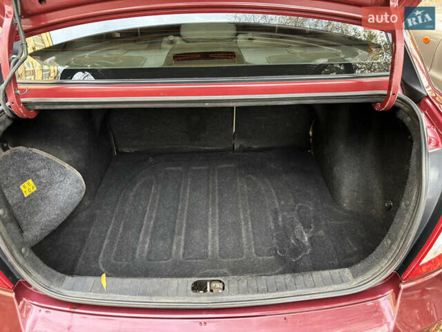 Красный Хендай Акцент, объемом двигателя 1.4 л и пробегом 200 тыс. км за 4750 $, фото 11 на Automoto.ua