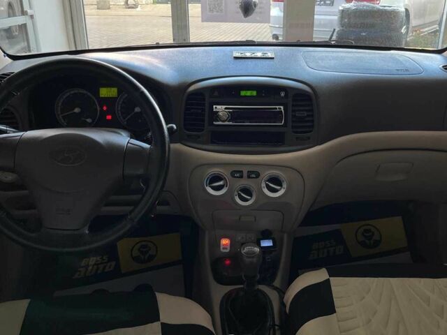 Красный Хендай Акцент, объемом двигателя 1.4 л и пробегом 233 тыс. км за 5000 $, фото 9 на Automoto.ua