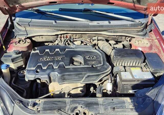 Красный Хендай Акцент, объемом двигателя 1.4 л и пробегом 325 тыс. км за 4000 $, фото 17 на Automoto.ua