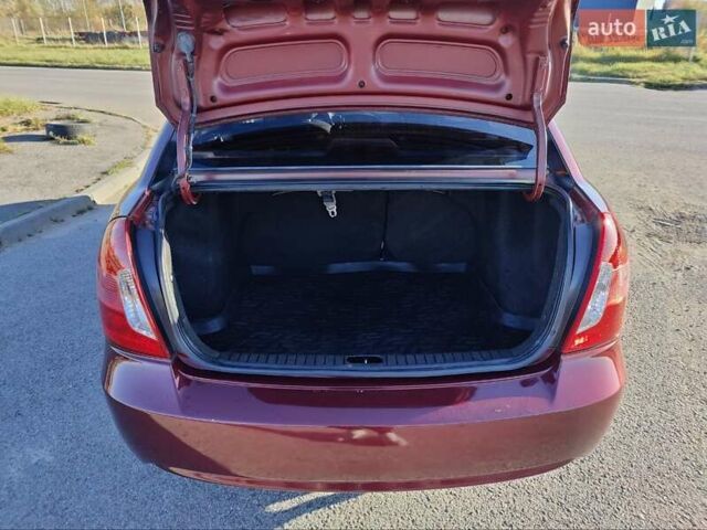 Червоний Хендай Акцент, об'ємом двигуна 1.4 л та пробігом 168 тис. км за 3900 $, фото 19 на Automoto.ua