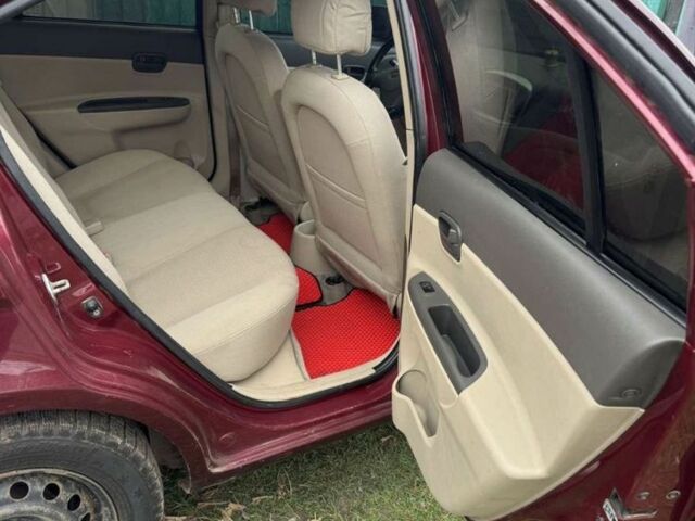 Красный Хендай Акцент, объемом двигателя 1.6 л и пробегом 218 тыс. км за 5100 $, фото 9 на Automoto.ua