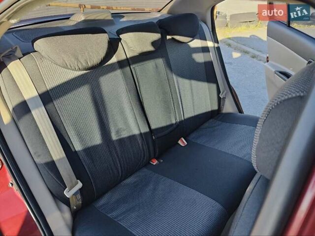 Червоний Хендай Акцент, об'ємом двигуна 1.4 л та пробігом 168 тис. км за 3900 $, фото 16 на Automoto.ua