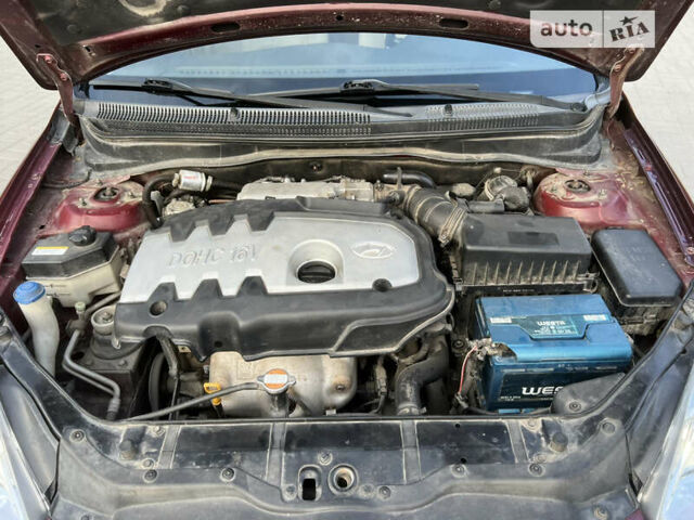 Червоний Хендай Акцент, об'ємом двигуна 1.39 л та пробігом 157 тис. км за 5750 $, фото 29 на Automoto.ua