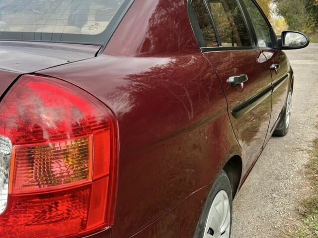 Хендай Акцент 2009 у Запоріжжя на Automoto.ua Червоний Хендай Акцент, об'ємом двигуна 1.4 л та пробігом 215 тис. км за 4250 $, фото 9 на Automoto.ua