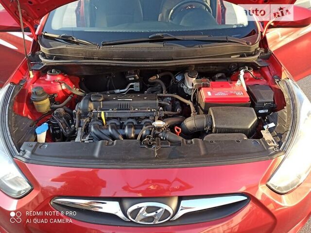 Красный Хендай Акцент, объемом двигателя 1.4 л и пробегом 93 тыс. км за 9900 $, фото 6 на Automoto.ua