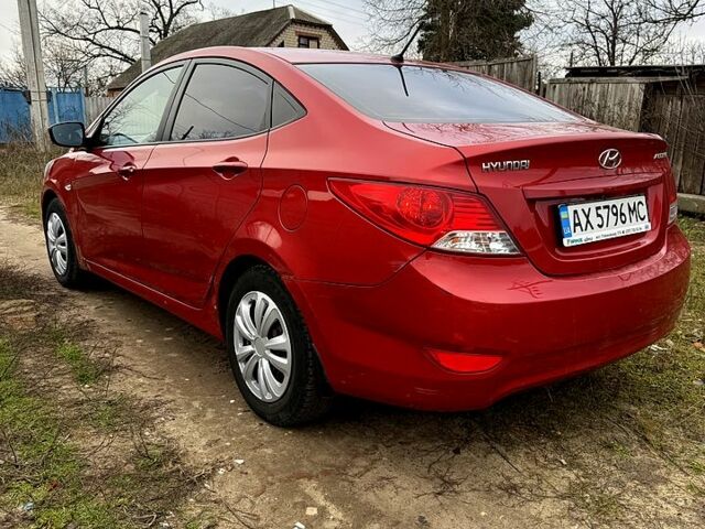 Красный Хендай Акцент, объемом двигателя 1.4 л и пробегом 133 тыс. км за 4500 $, фото 5 на Automoto.ua