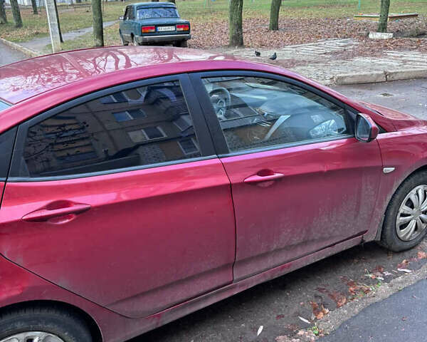 Красный Хендай Акцент, объемом двигателя 1.4 л и пробегом 133 тыс. км за 4800 $, фото 5 на Automoto.ua