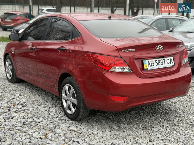 Красный Хендай Акцент, объемом двигателя 1.4 л и пробегом 172 тыс. км за 6800 $, фото 7 на Automoto.ua