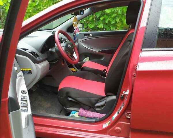 Червоний Хендай Акцент, об'ємом двигуна 1.6 л та пробігом 91 тис. км за 8400 $, фото 5 на Automoto.ua