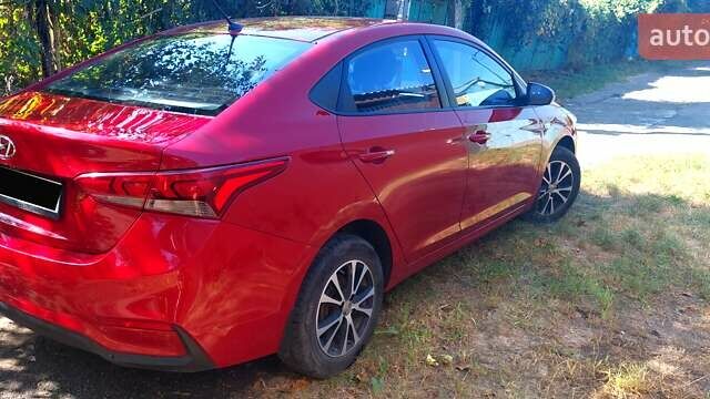 Красный Хендай Акцент, объемом двигателя 1.37 л и пробегом 144 тыс. км за 9600 $, фото 3 на Automoto.ua