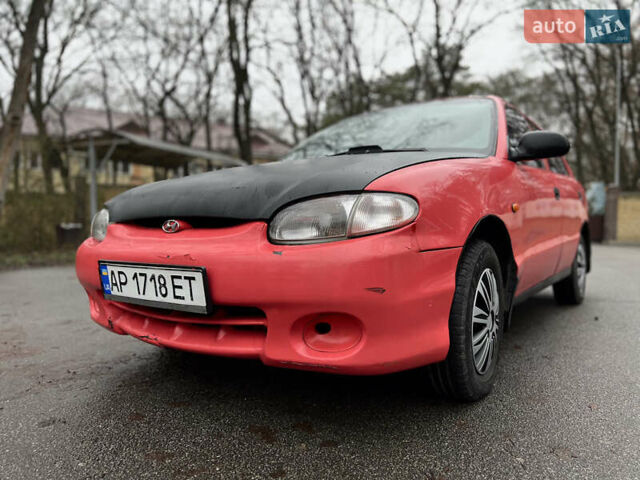 Красный Хендай Акцент, объемом двигателя 1.3 л и пробегом 300 тыс. км за 1200 $, фото 11 на Automoto.ua