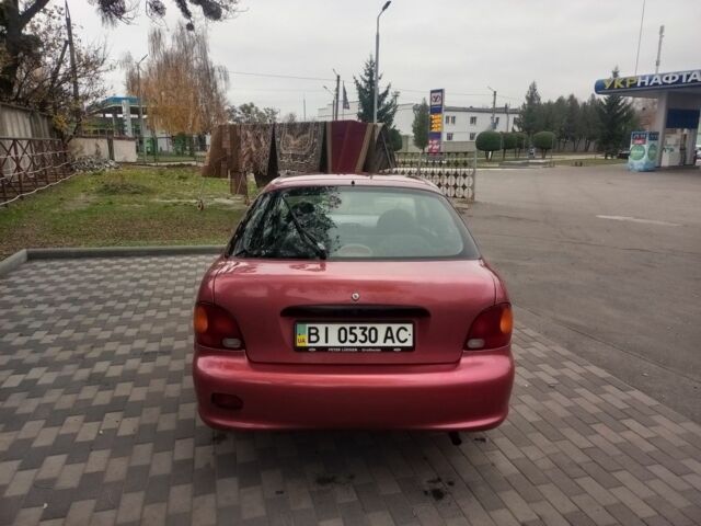 Червоний Хендай Акцент, об'ємом двигуна 1.4 л та пробігом 200 тис. км за 1250 $, фото 3 на Automoto.ua