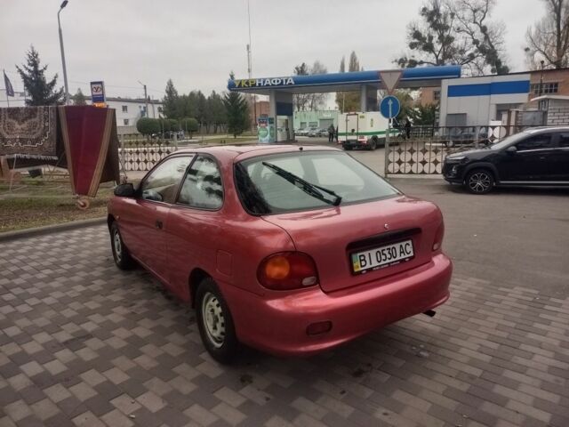 Червоний Хендай Акцент, об'ємом двигуна 1.4 л та пробігом 200 тис. км за 1250 $, фото 5 на Automoto.ua