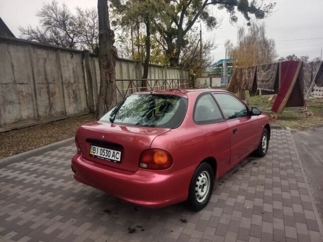 Червоний Хендай Акцент, об'ємом двигуна 1.4 л та пробігом 200 тис. км за 1250 $, фото 4 на Automoto.ua