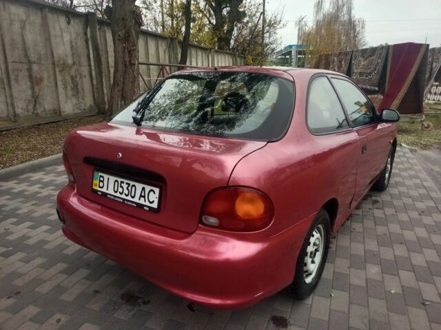 Червоний Хендай Акцент, об'ємом двигуна 1.4 л та пробігом 200 тис. км за 1250 $, фото 1 на Automoto.ua