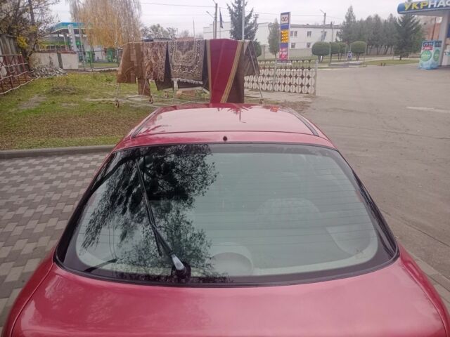 Червоний Хендай Акцент, об'ємом двигуна 1.4 л та пробігом 200 тис. км за 1250 $, фото 7 на Automoto.ua