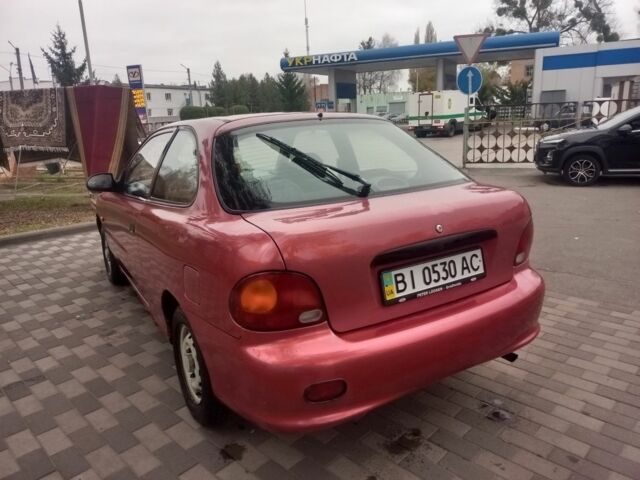 Червоний Хендай Акцент, об'ємом двигуна 1.4 л та пробігом 200 тис. км за 1250 $, фото 10 на Automoto.ua