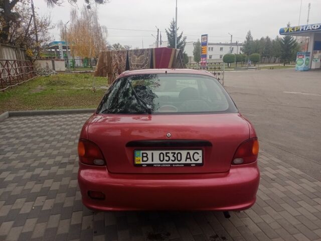 Червоний Хендай Акцент, об'ємом двигуна 1.4 л та пробігом 200 тис. км за 1250 $, фото 6 на Automoto.ua