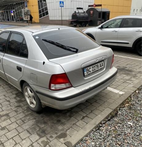 Серый Хендай Акцент, объемом двигателя 1.3 л и пробегом 180 тыс. км за 1999 $, фото 4 на Automoto.ua