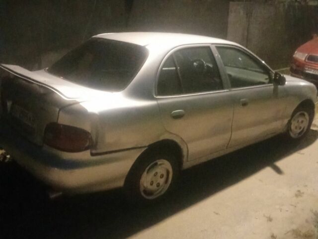 Серый Хендай Акцент, объемом двигателя 1.5 л и пробегом 1000 тыс. км за 358 $, фото 1 на Automoto.ua