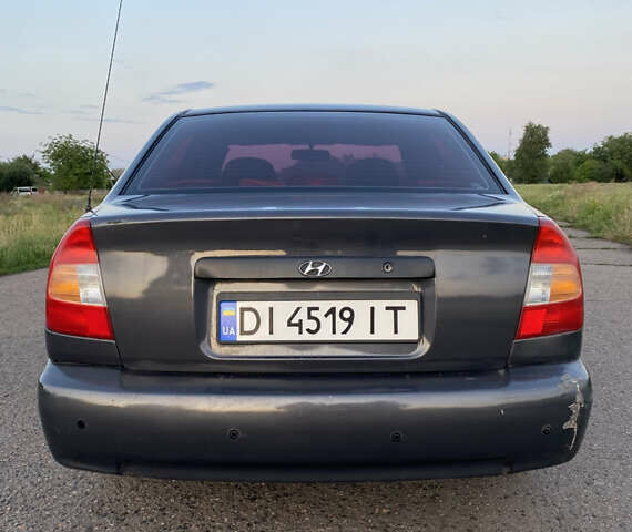 Серый Хендай Акцент, объемом двигателя 1.34 л и пробегом 306 тыс. км за 2635 $, фото 3 на Automoto.ua