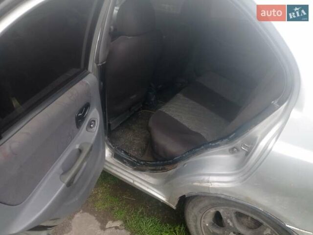 Серый Хендай Акцент, объемом двигателя 1.6 л и пробегом 330 тыс. км за 1500 $, фото 19 на Automoto.ua