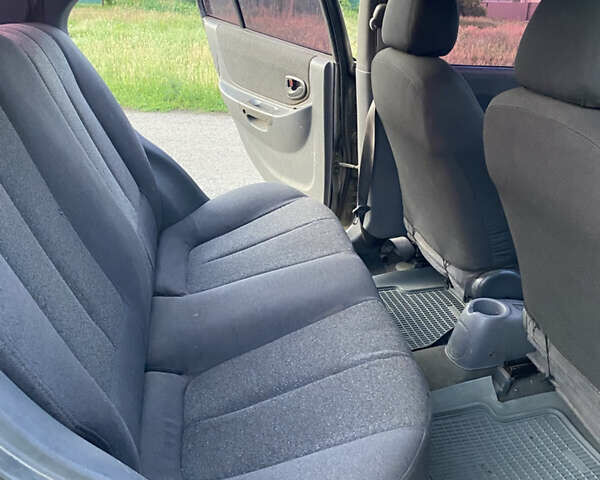 Серый Хендай Акцент, объемом двигателя 1.34 л и пробегом 306 тыс. км за 2635 $, фото 6 на Automoto.ua