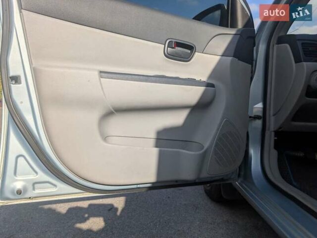 Серый Хендай Акцент, объемом двигателя 1.4 л и пробегом 118 тыс. км за 5000 $, фото 7 на Automoto.ua