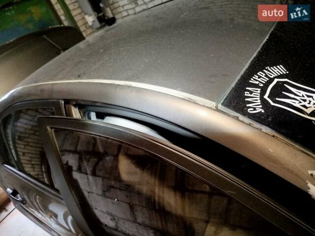 Серый Хендай Акцент, объемом двигателя 1.5 л и пробегом 210 тыс. км за 3500 $, фото 5 на Automoto.ua