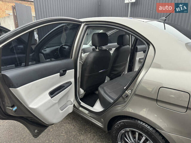 Серый Хендай Акцент, объемом двигателя 1.4 л и пробегом 122 тыс. км за 4500 $, фото 11 на Automoto.ua