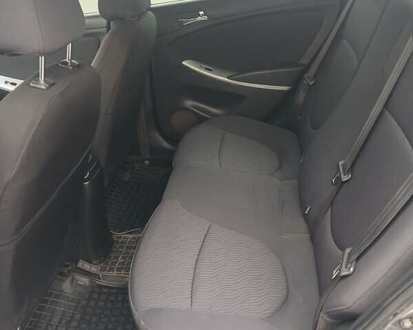 Серый Хендай Акцент, объемом двигателя 1.4 л и пробегом 238 тыс. км за 5950 $, фото 14 на Automoto.ua