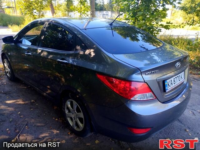 Серый Хендай Акцент, объемом двигателя 1.4 л и пробегом 305 тыс. км за 6300 $, фото 3 на Automoto.ua