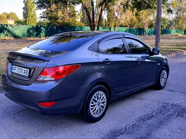 Серый Хендай Акцент, объемом двигателя 1.4 л и пробегом 229 тыс. км за 6500 $, фото 2 на Automoto.ua