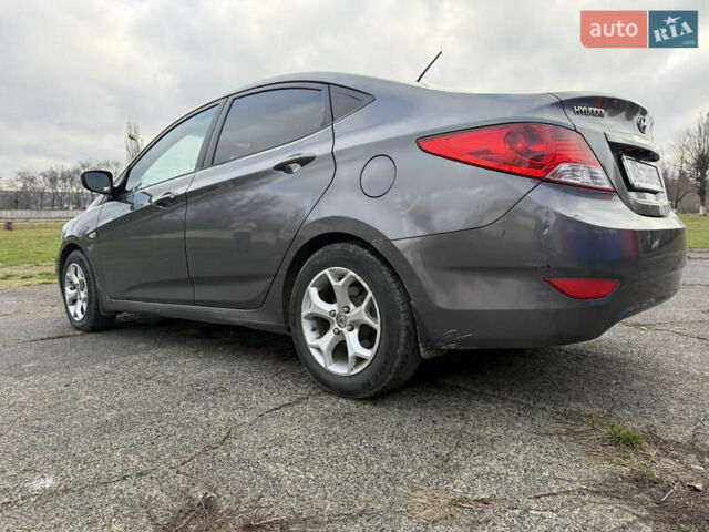 Серый Хендай Акцент, объемом двигателя 1.4 л и пробегом 206 тыс. км за 6400 $, фото 10 на Automoto.ua