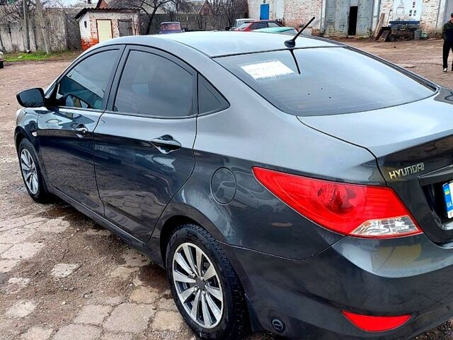 Серый Хендай Акцент, объемом двигателя 1.4 л и пробегом 165 тыс. км за 6500 $, фото 7 на Automoto.ua