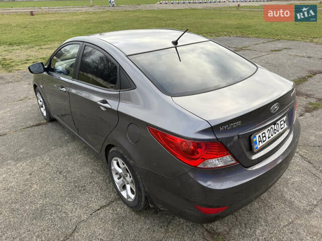 Серый Хендай Акцент, объемом двигателя 1.4 л и пробегом 206 тыс. км за 6400 $, фото 14 на Automoto.ua