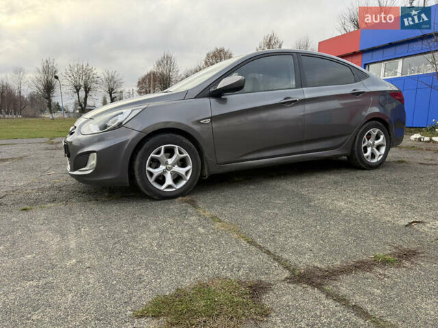 Серый Хендай Акцент, объемом двигателя 1.4 л и пробегом 206 тыс. км за 6400 $, фото 4 на Automoto.ua