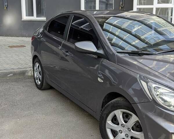 Серый Хендай Акцент, объемом двигателя 1.4 л и пробегом 233 тыс. км за 6250 $, фото 14 на Automoto.ua