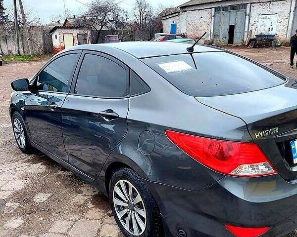 Серый Хендай Акцент, объемом двигателя 1.4 л и пробегом 165 тыс. км за 6500 $, фото 6 на Automoto.ua