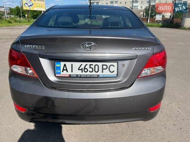 Серый Хендай Акцент, объемом двигателя 1.4 л и пробегом 203 тыс. км за 6400 $, фото 7 на Automoto.ua