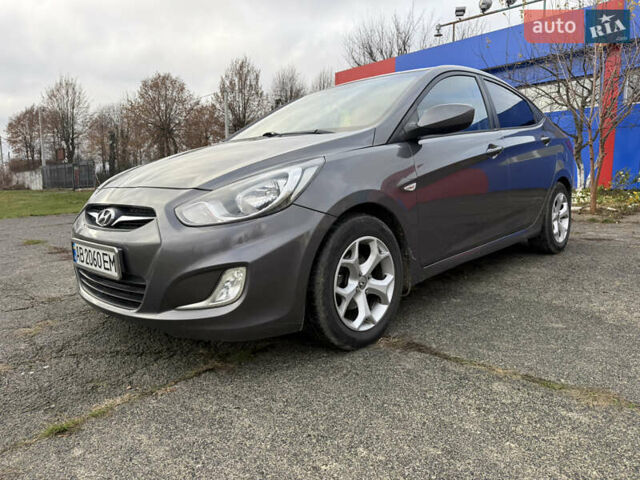 Серый Хендай Акцент, объемом двигателя 1.4 л и пробегом 206 тыс. км за 6400 $, фото 1 на Automoto.ua