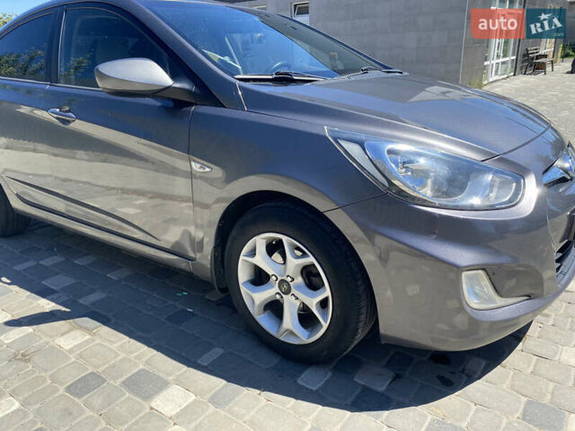Серый Хендай Акцент, объемом двигателя 1.4 л и пробегом 200 тыс. км за 6950 $, фото 11 на Automoto.ua