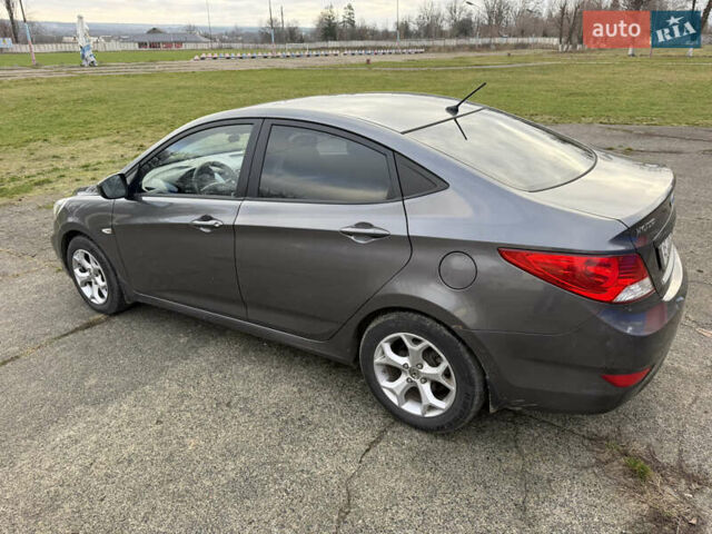 Серый Хендай Акцент, объемом двигателя 1.4 л и пробегом 206 тыс. км за 6400 $, фото 8 на Automoto.ua