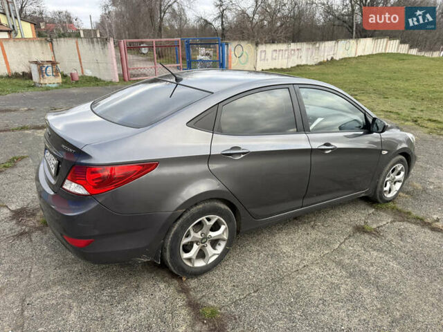 Серый Хендай Акцент, объемом двигателя 1.4 л и пробегом 206 тыс. км за 6400 $, фото 19 на Automoto.ua