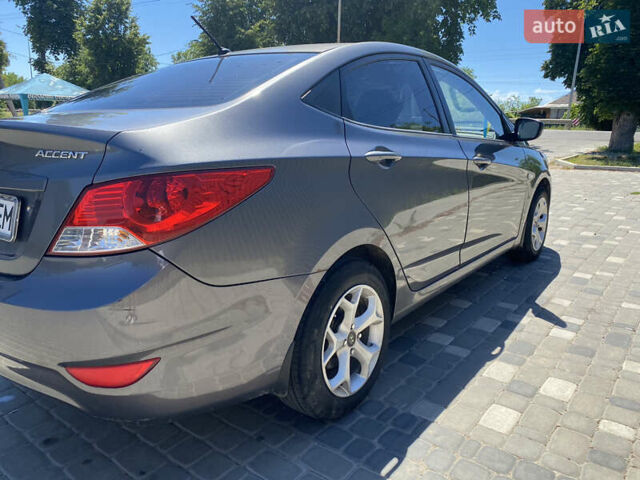 Серый Хендай Акцент, объемом двигателя 1.4 л и пробегом 200 тыс. км за 6950 $, фото 10 на Automoto.ua