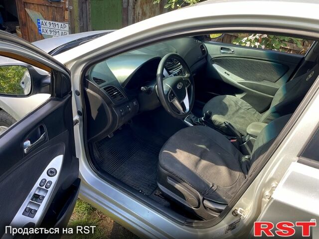 Серый Хендай Акцент, объемом двигателя 1.4 л и пробегом 290 тыс. км за 4600 $, фото 7 на Automoto.ua